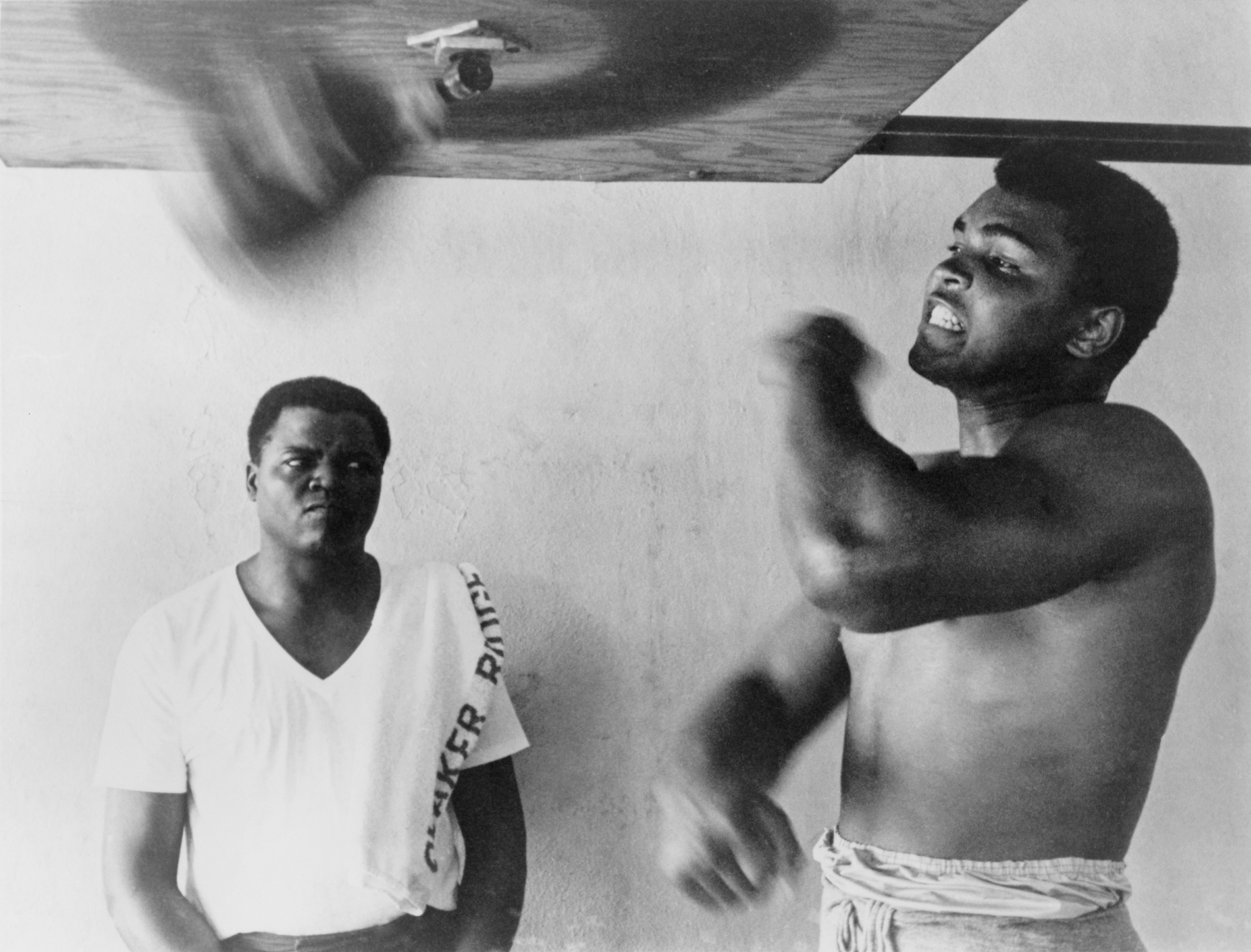 Muhammad Ali, works out on light bag in Miami, Florida. 1965., Image: 101845325, License: Rights-managed, Restrictions: For usage credit please use; Courtesy Everett Collection, Model Release: no, Credit line: Profimedia, Everett